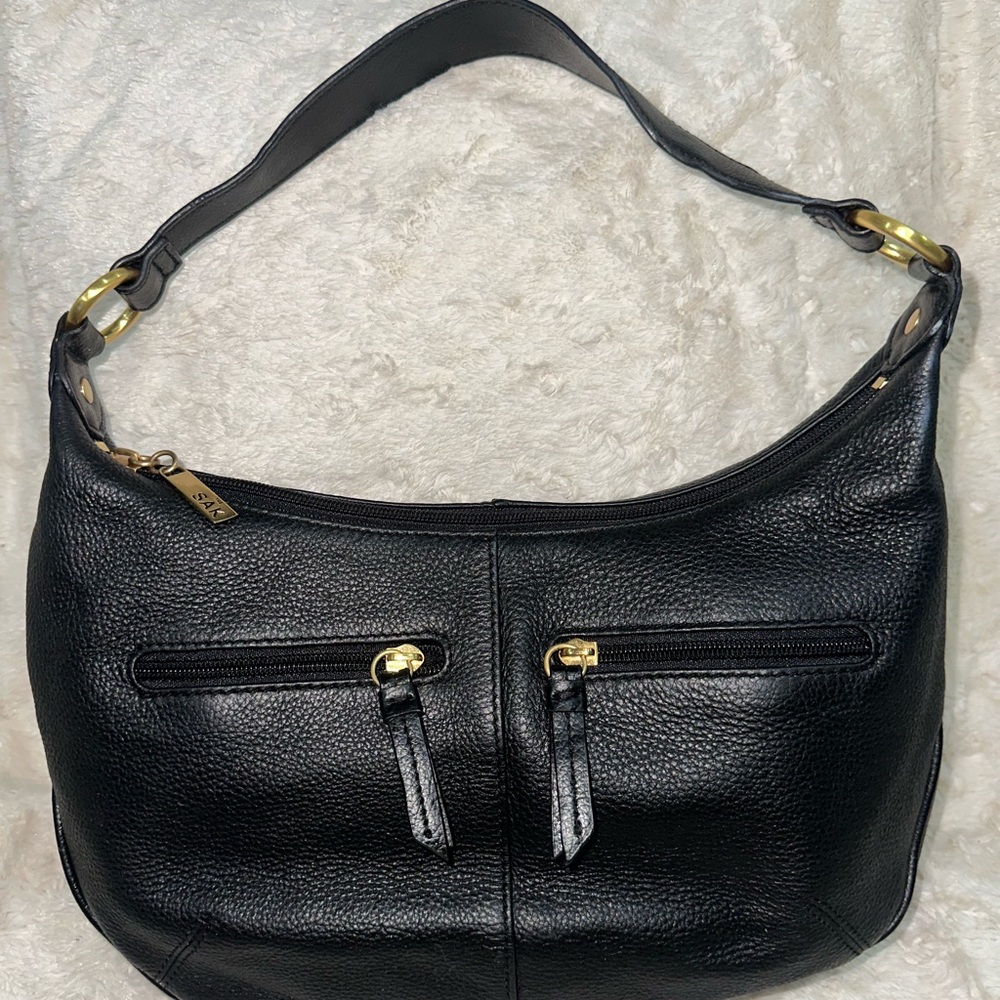 The Sak Black Pebbled Leather Shoulder Bag with Gold Hardware